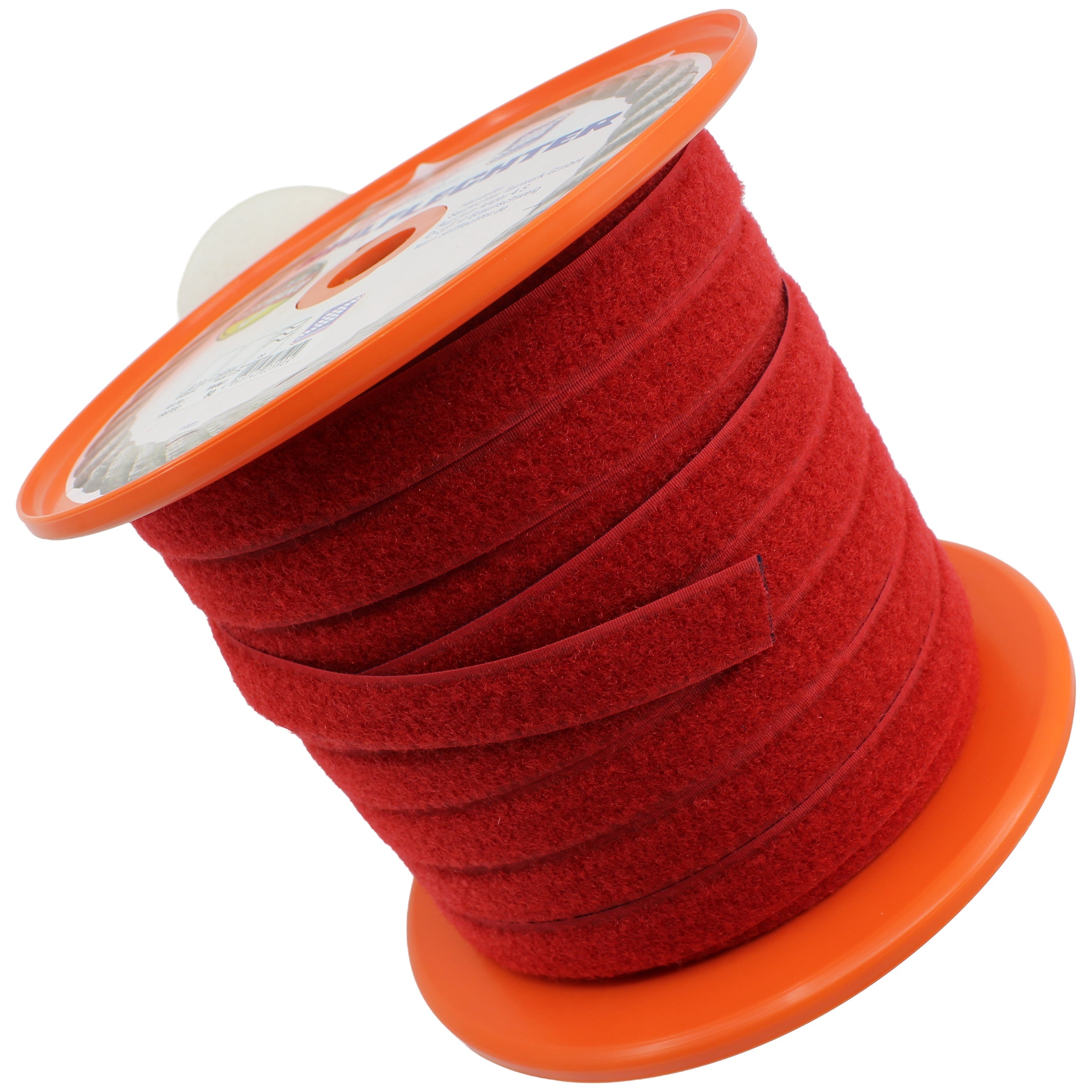 Orange Spule mit aufgewickeltem roten Flauschband.